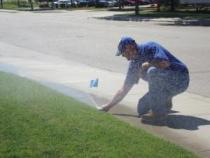 a sprinkler repair contractor tags a sprinkler head as optimized
